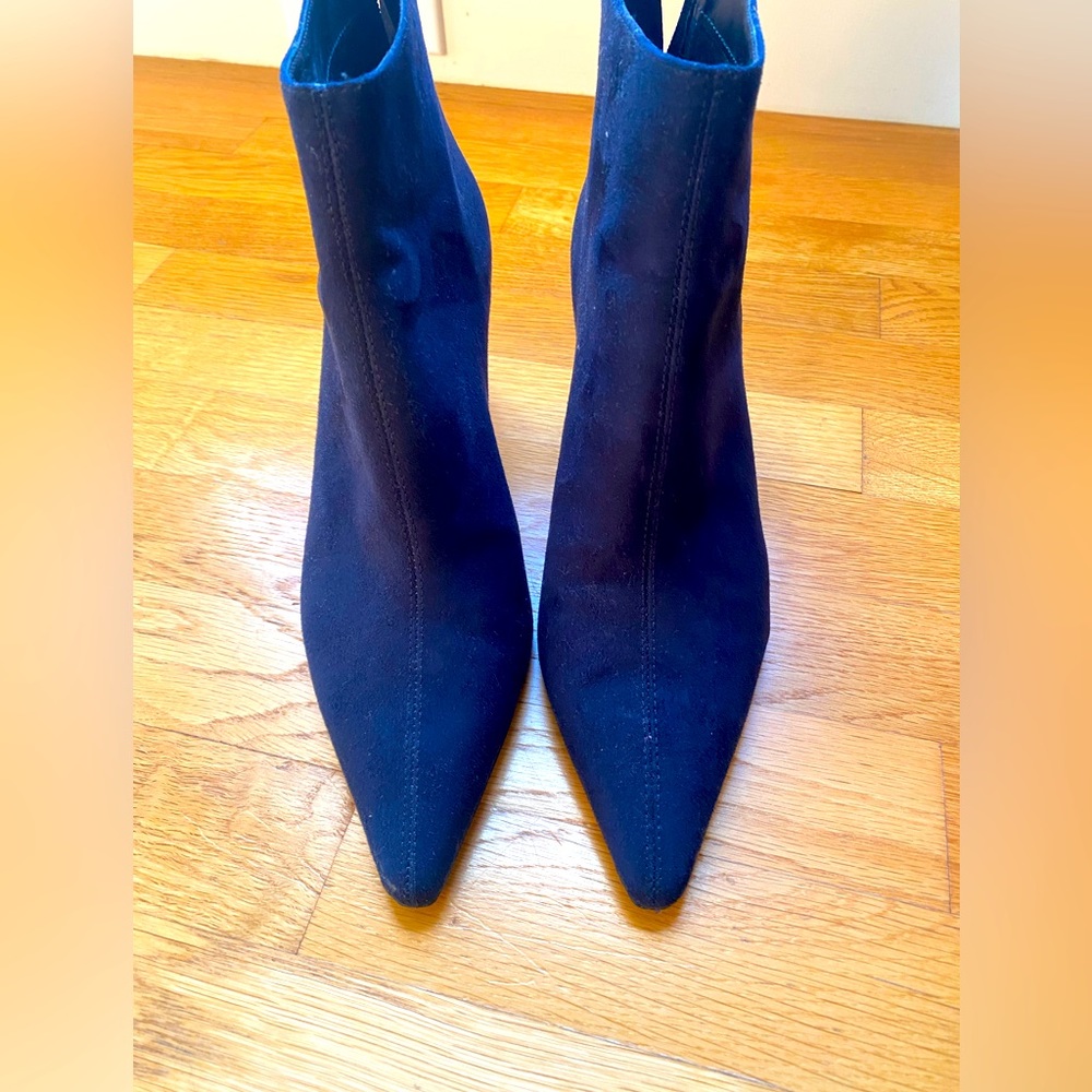 Navy blue suede booties with zip back